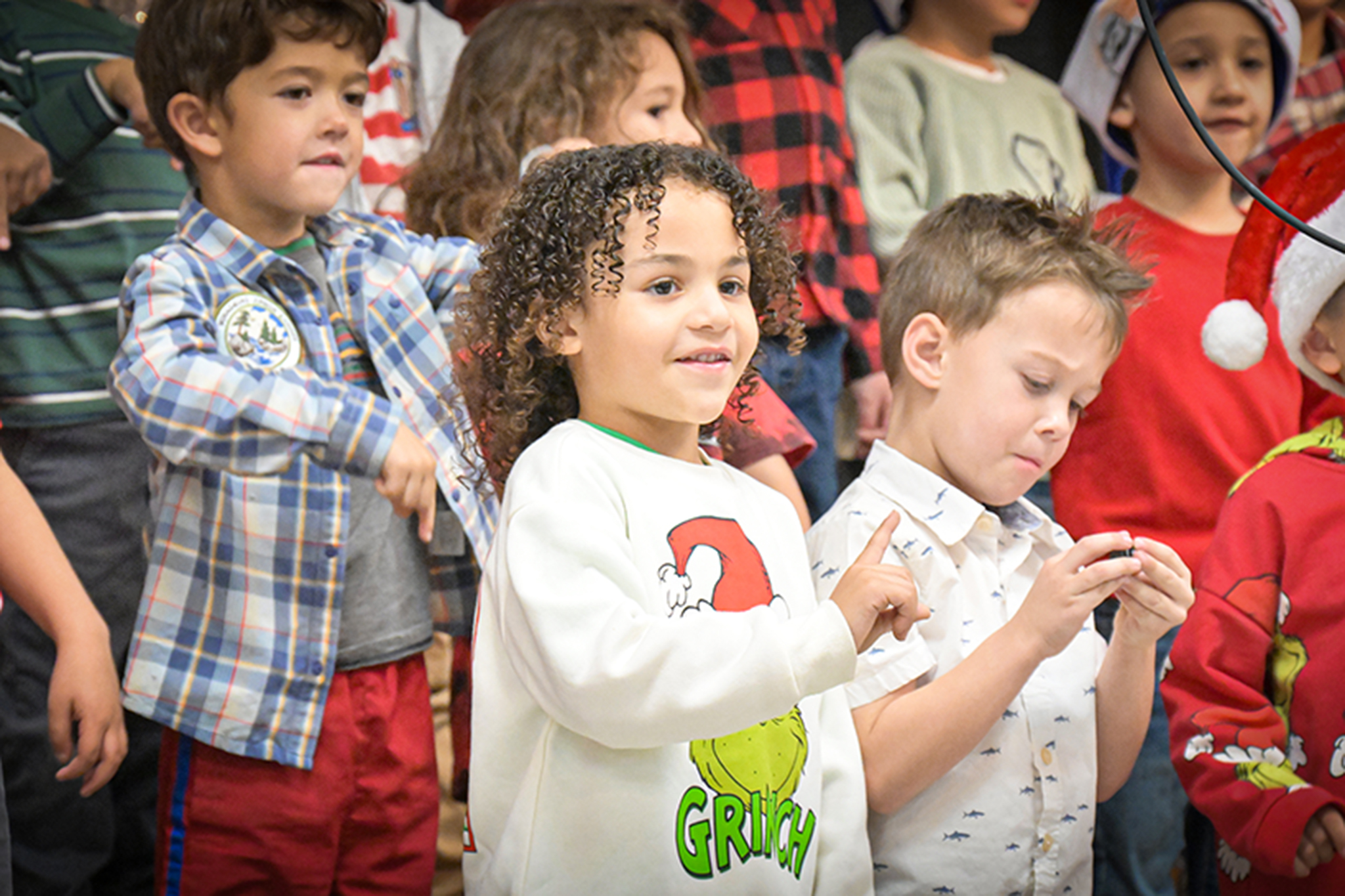 Kinder students perform a song